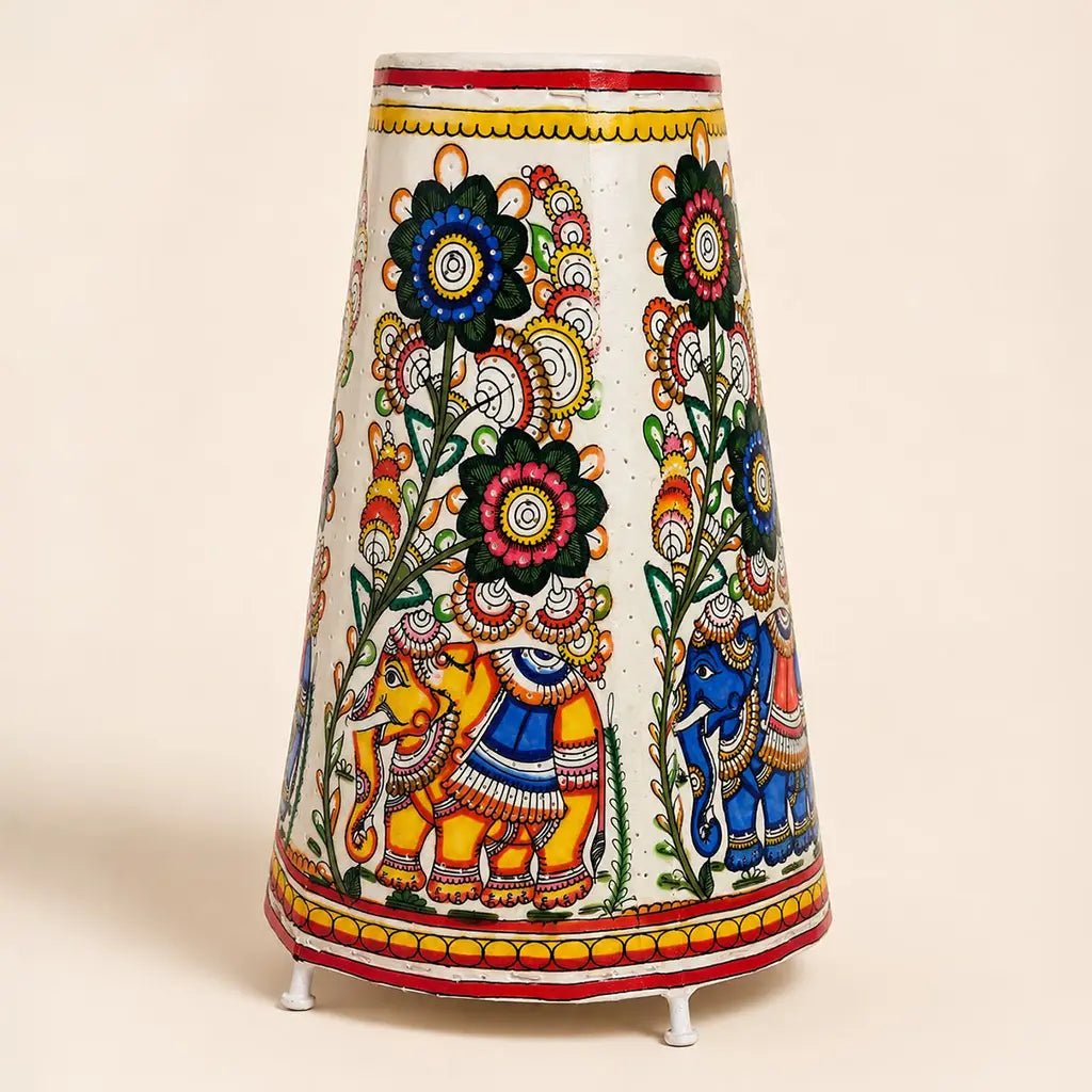 Hand-painted multi-color Tholu Bommalata leather table lamp featuring a green royal elephant and floral blooms