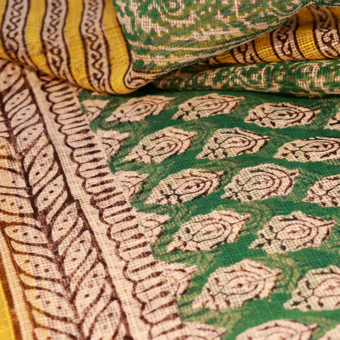 Shop Green Kotadoria saree featuring traditional block print design