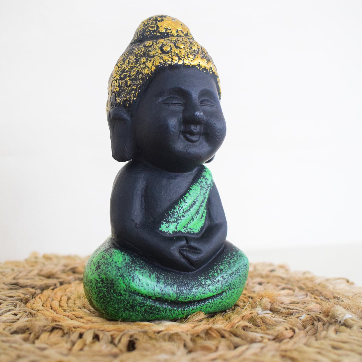 A Handmade, Hand-Painted Little Buddha Figurine