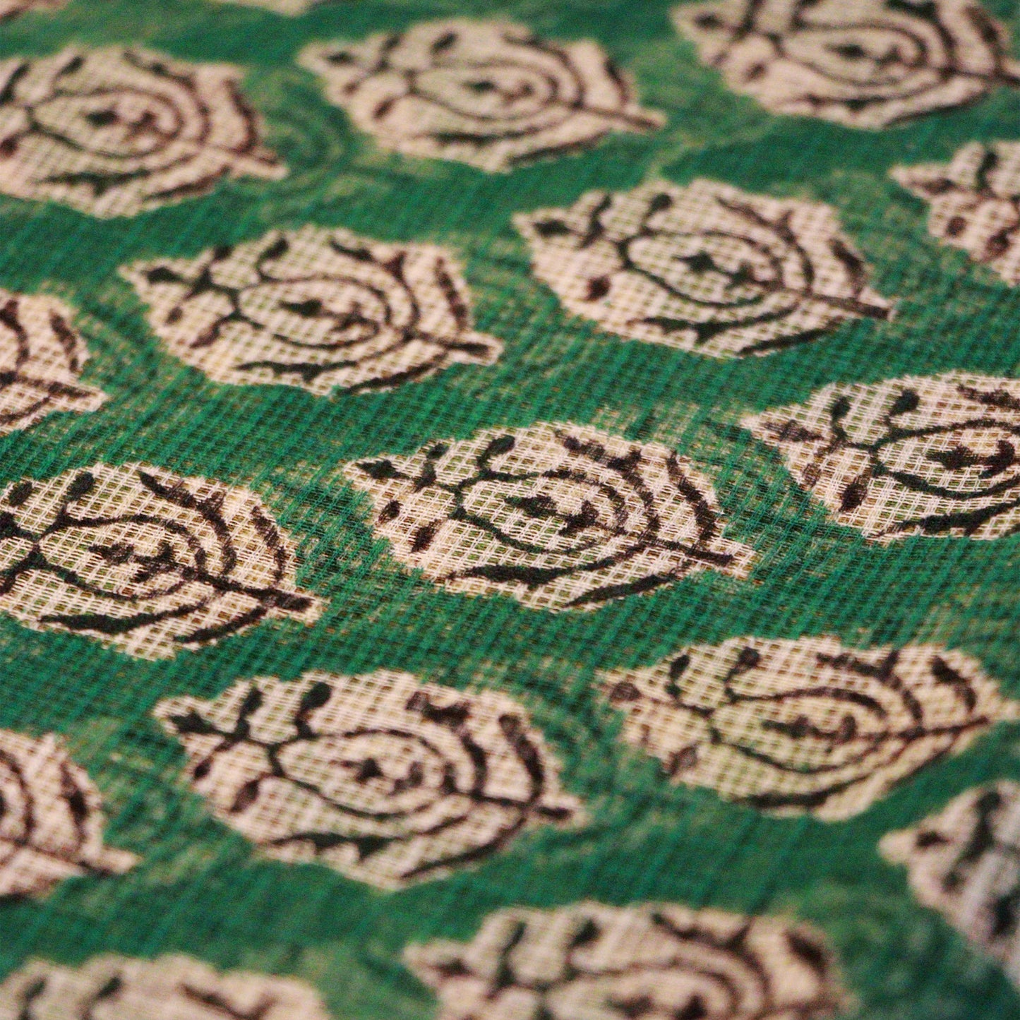 Shop Green Kotadoria saree featuring traditional block print design