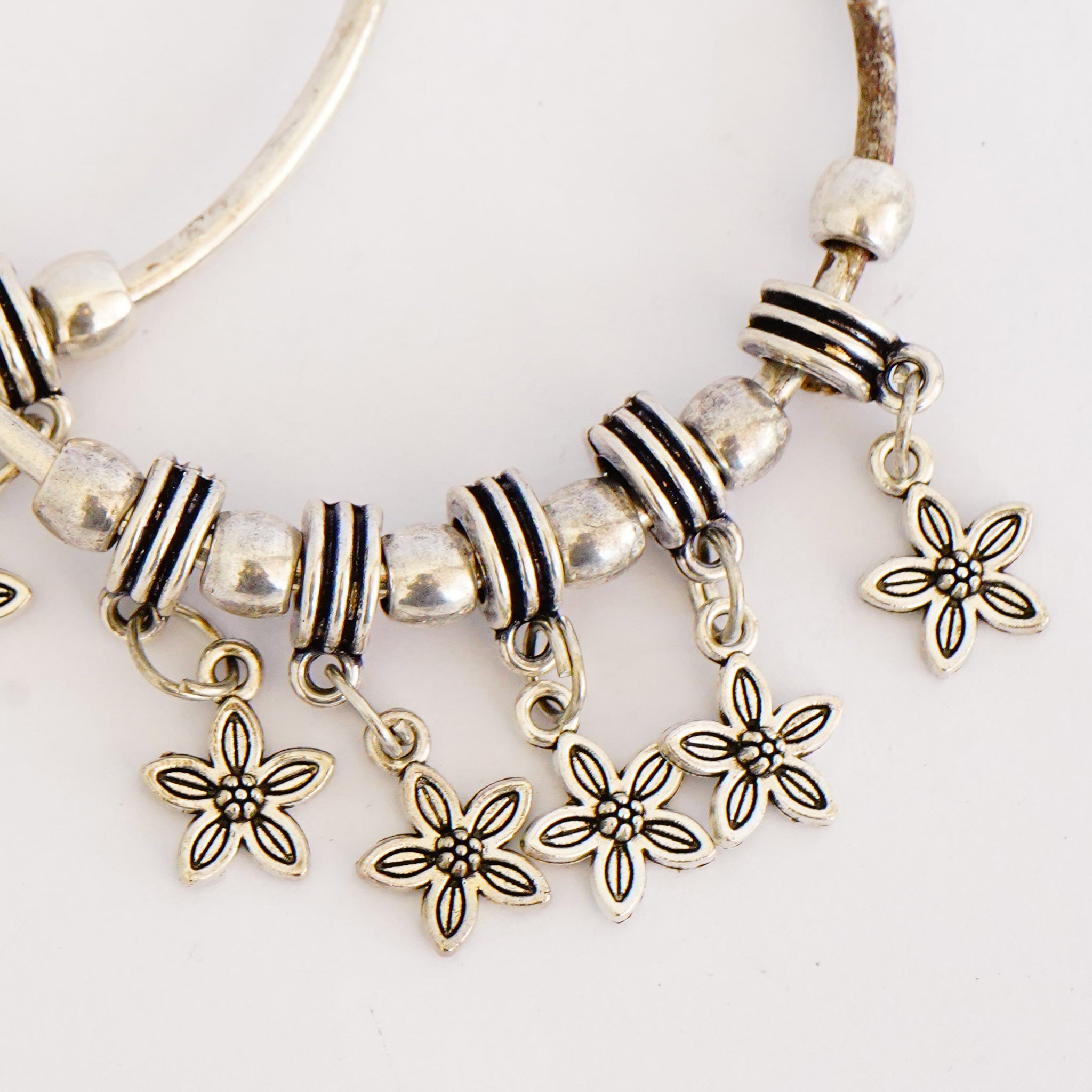 Oxidized German Silver Bangles with Dangling Flowers(Set of 2)