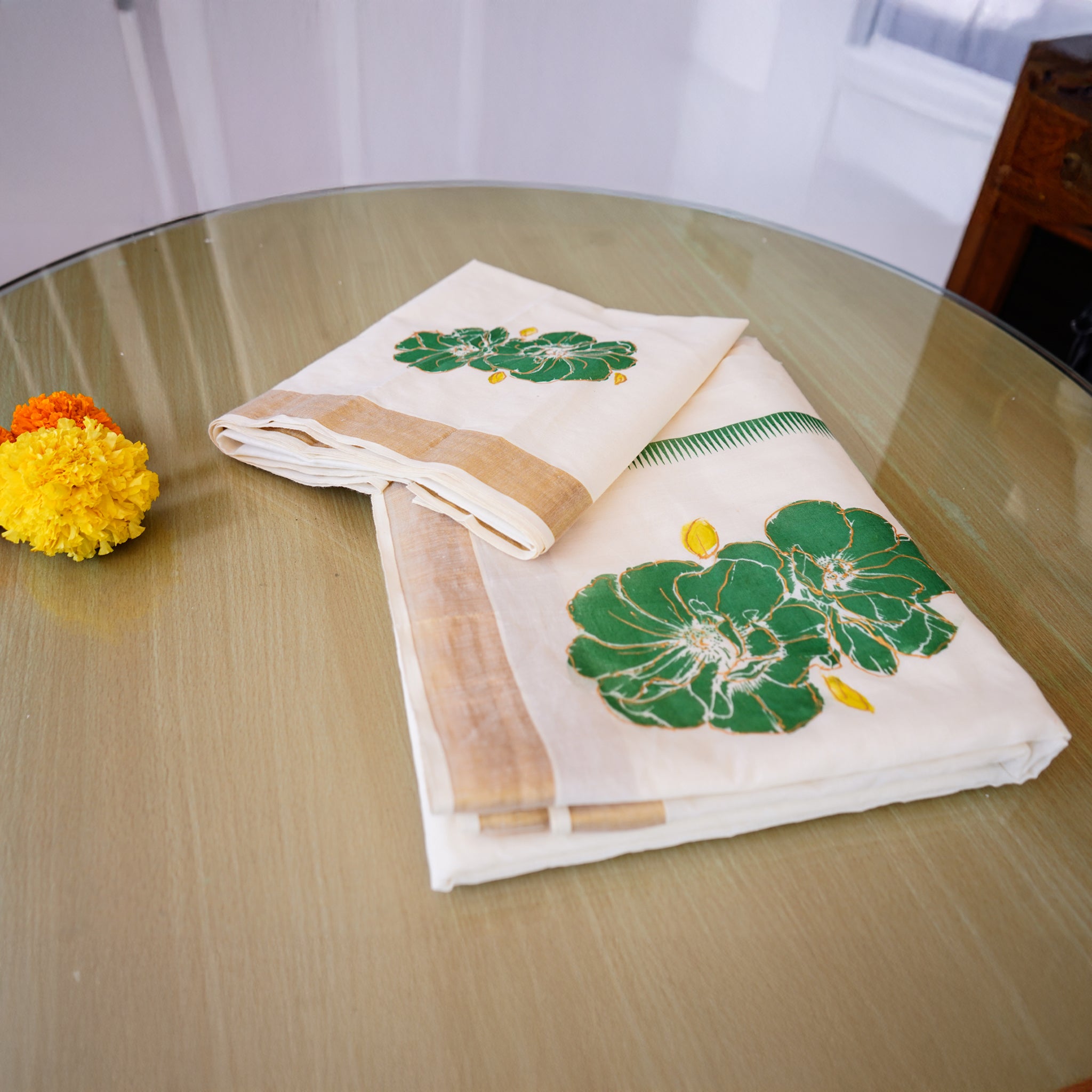 Elegant Kerala Kasavu Saree with Hand-Painted Green Floral Motifs