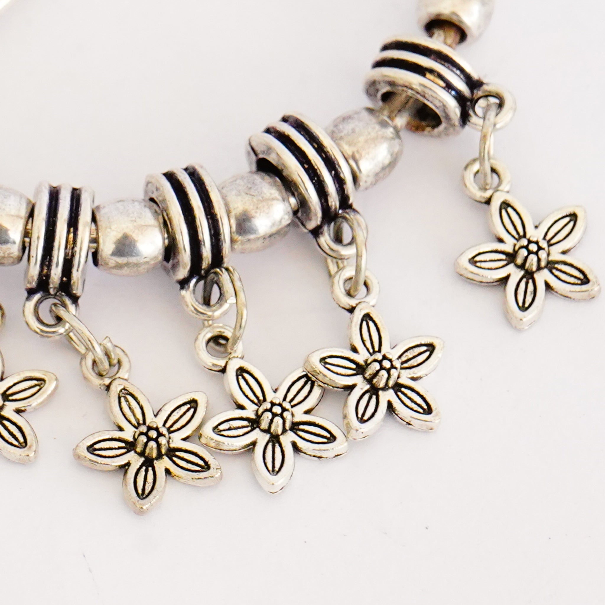 Oxidized German Silver Bangles with Dangling Flowers(Set of 2)