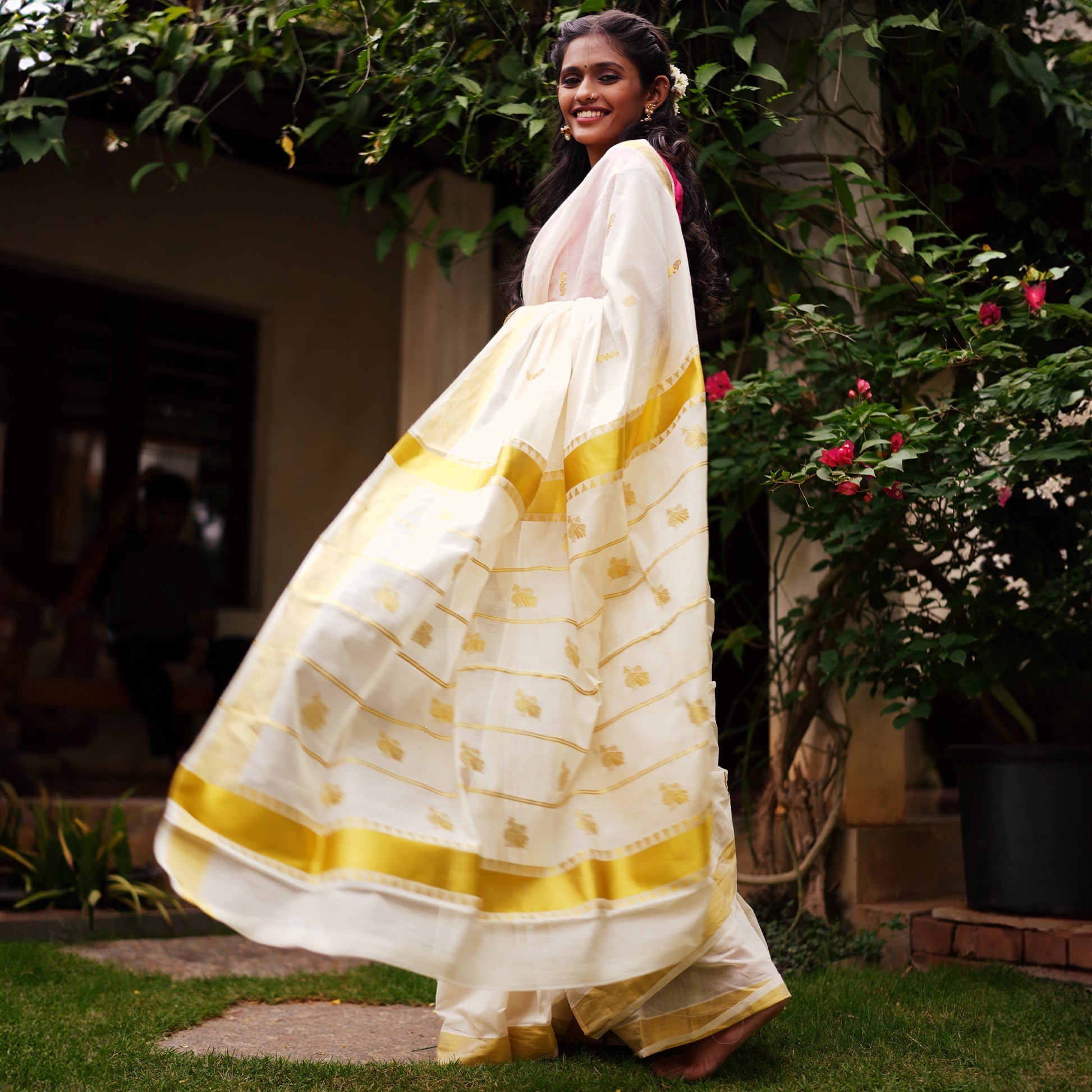 Shop Kerala Kasavu White Saree adorned with Zari Peacock Motif