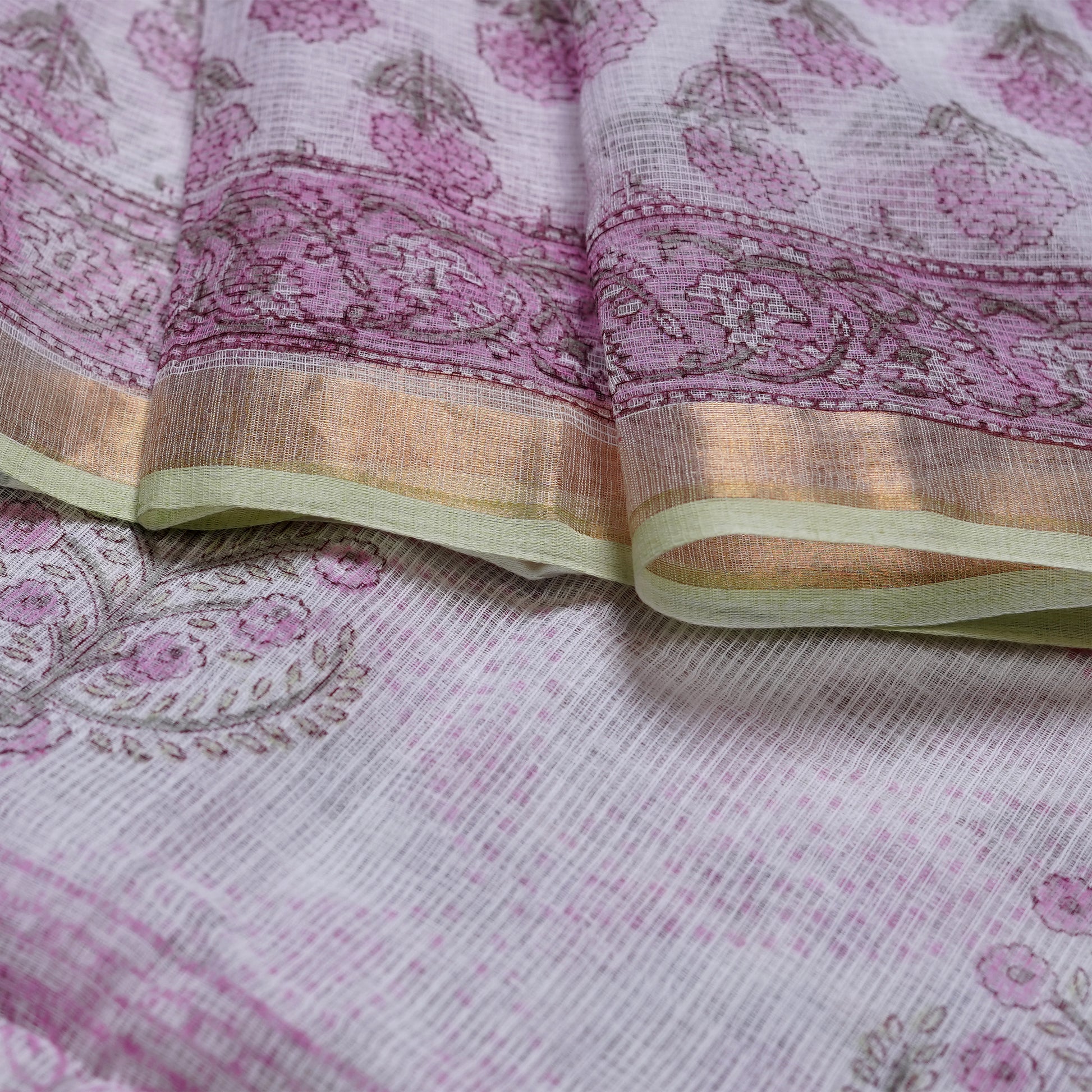 Shop Graceful white and pink Kotadoria cotton saree with delicate patterns