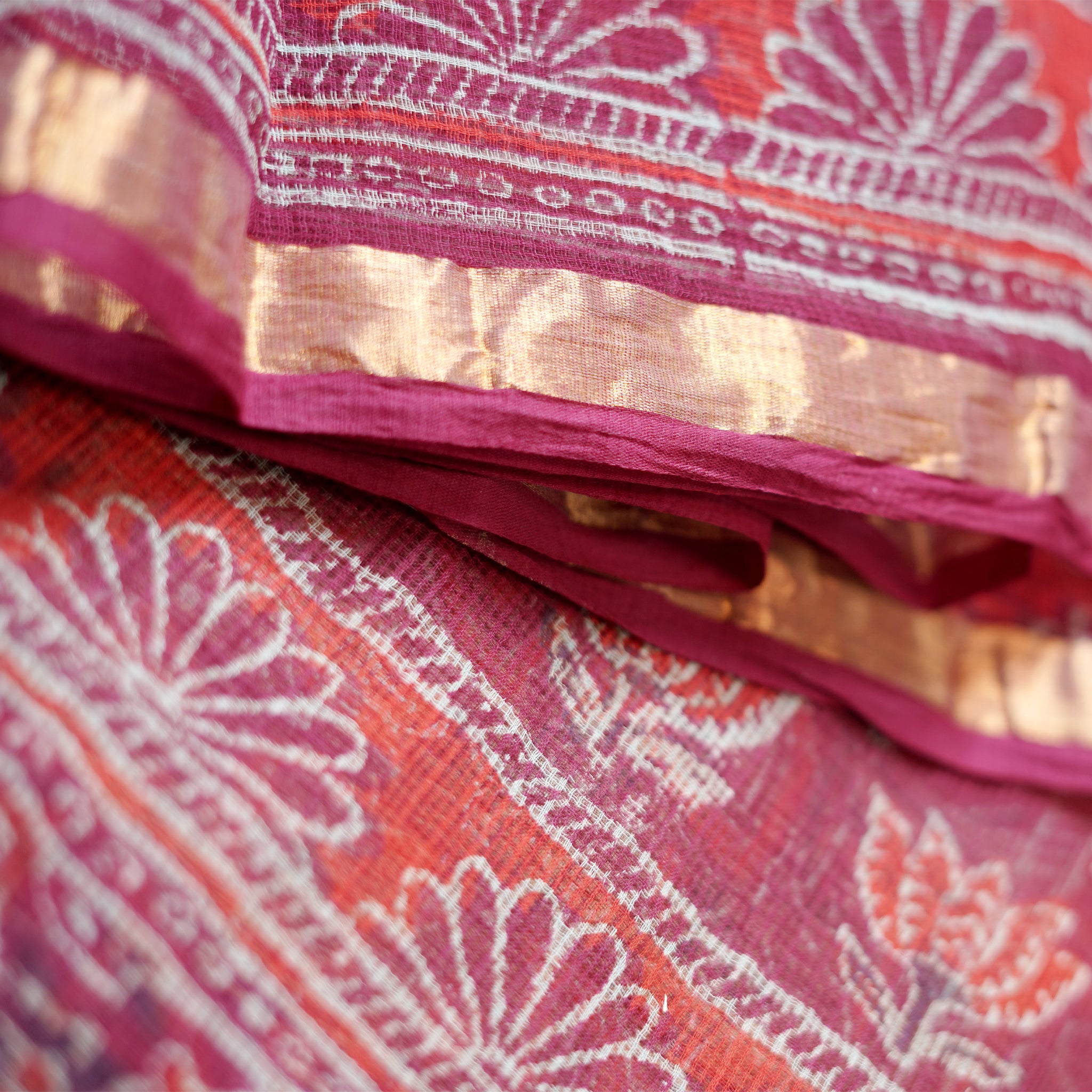 Shop wine red Kotadoria cotton saree with intricate details