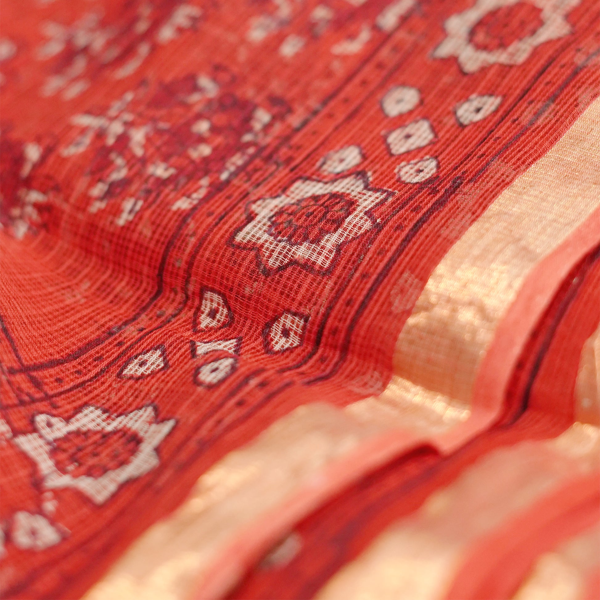 Shop bright red Kotadoria cotton saree showcasing traditional design