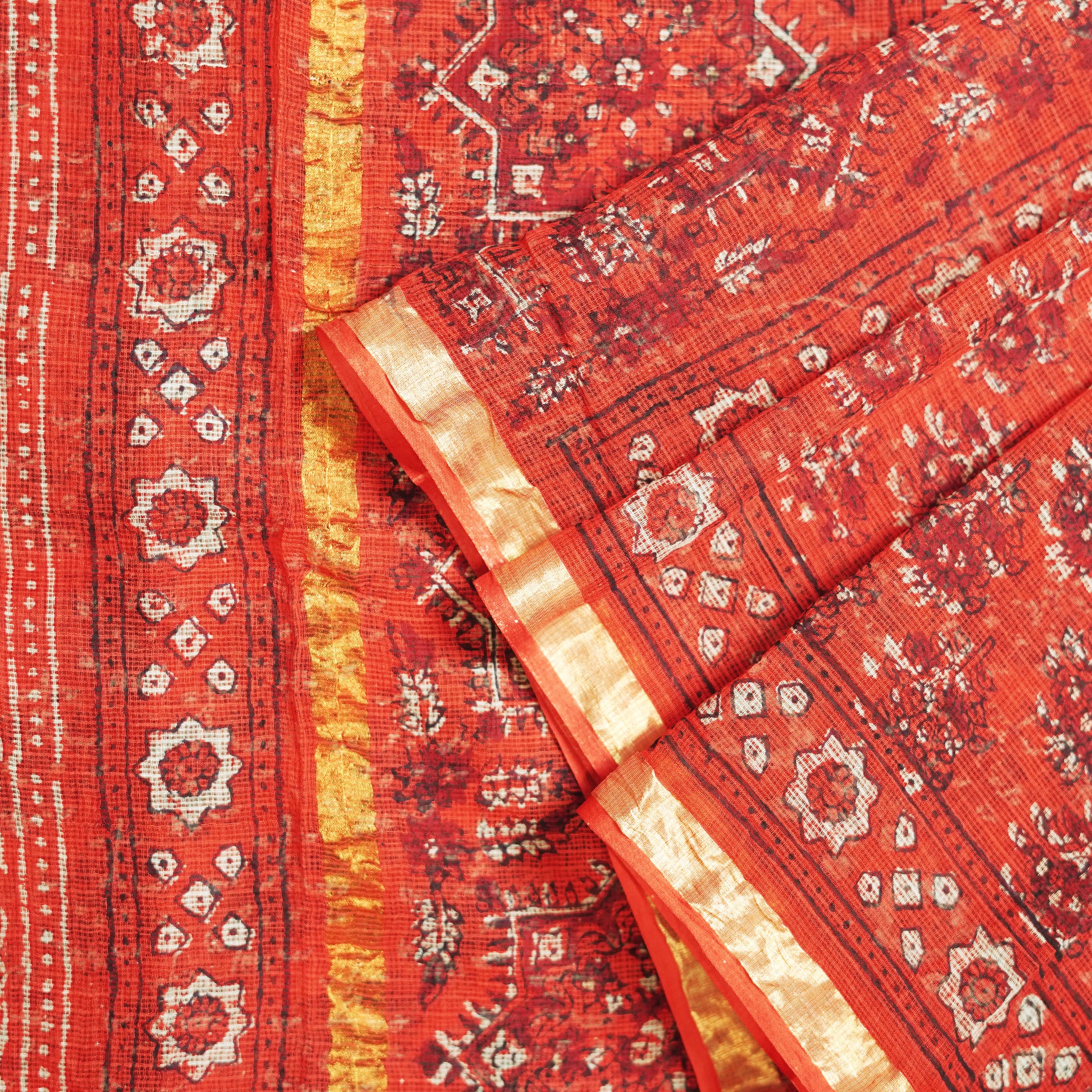 Shop bright red Kotadoria cotton saree showcasing traditional design