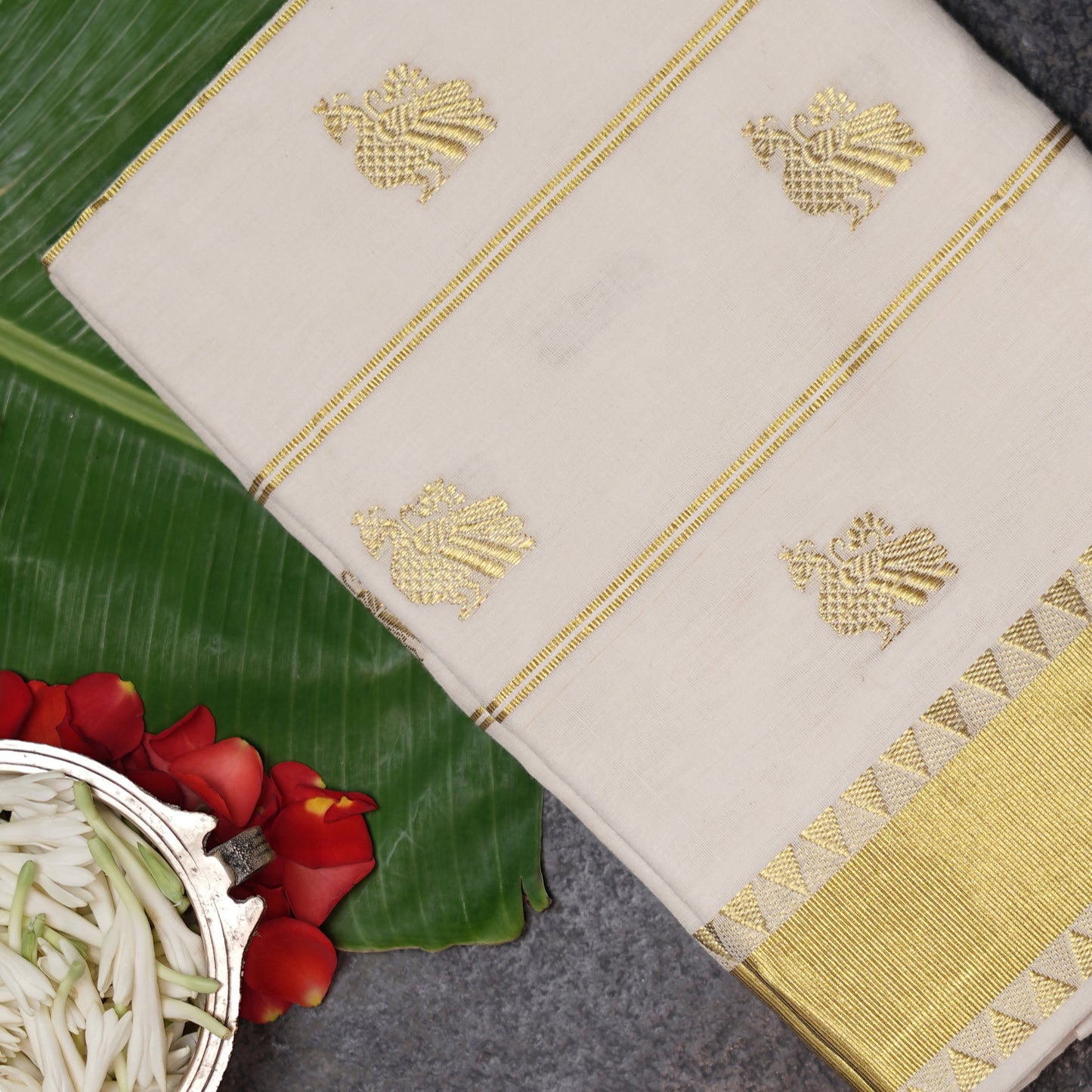 Shop Kerala Kasavu White Saree adorned with Zari Peacock Motif