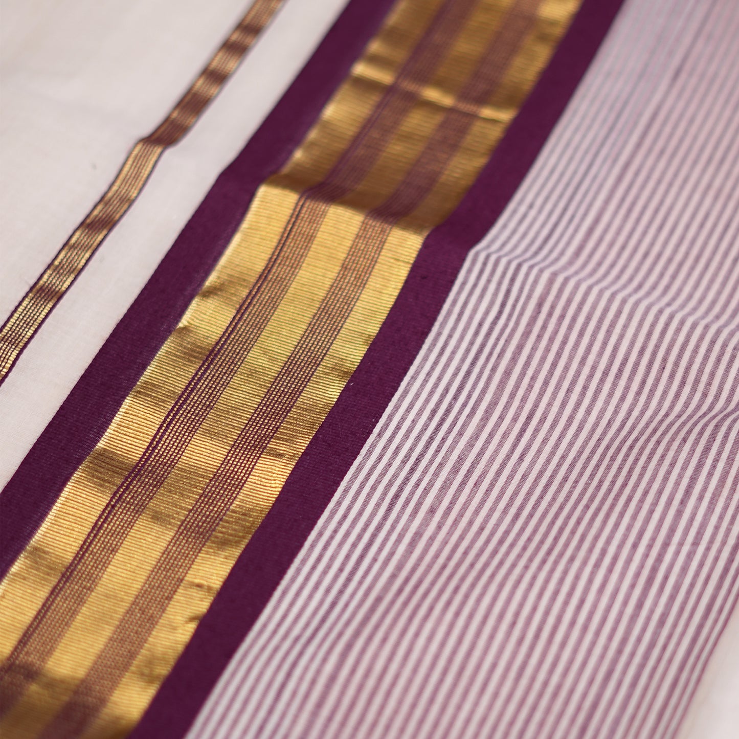 Shop Kerala Kasavu White Saree with Gold & Purple Border detailing Online