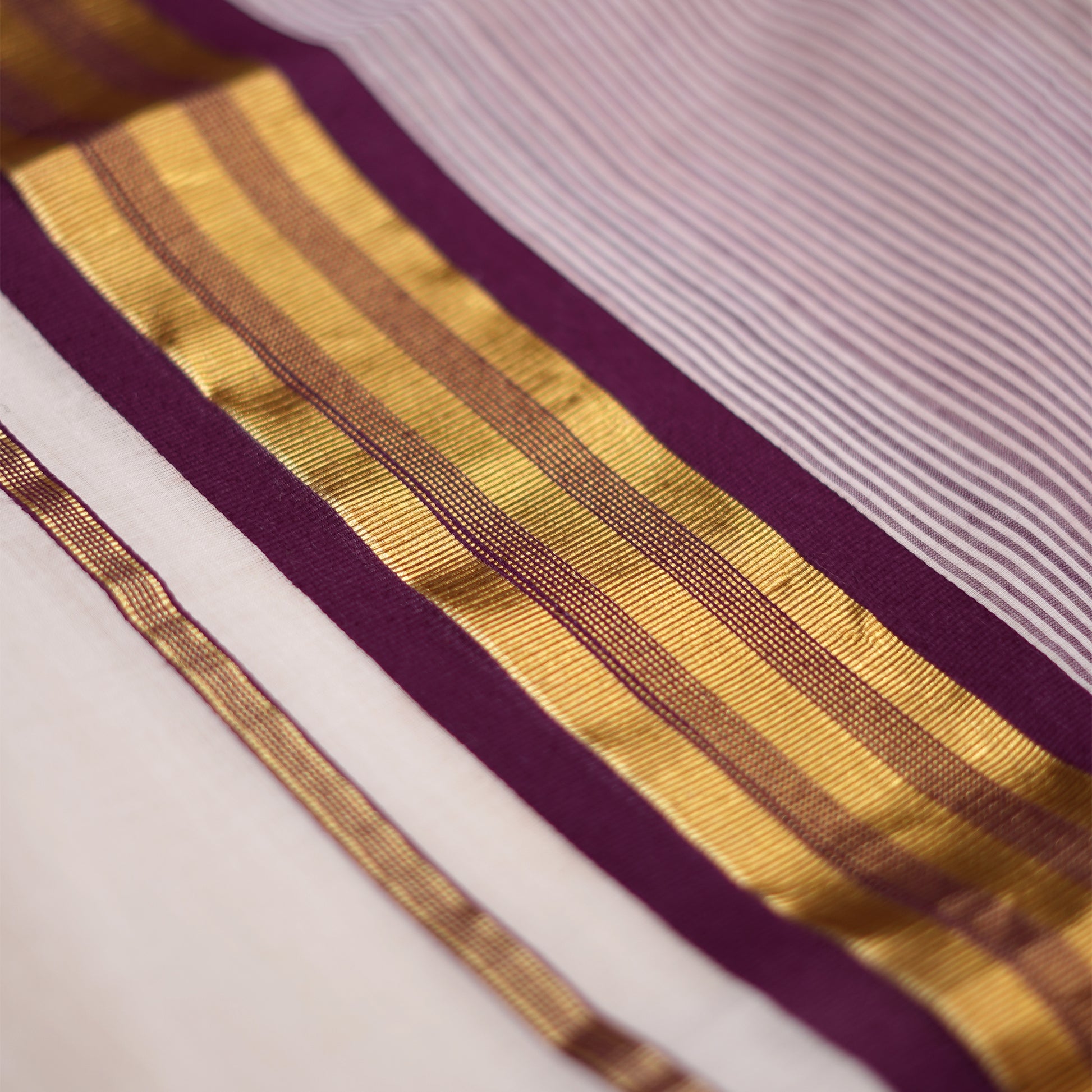 Shop Kerala Kasavu White Saree with Gold & Purple Border detailing Online