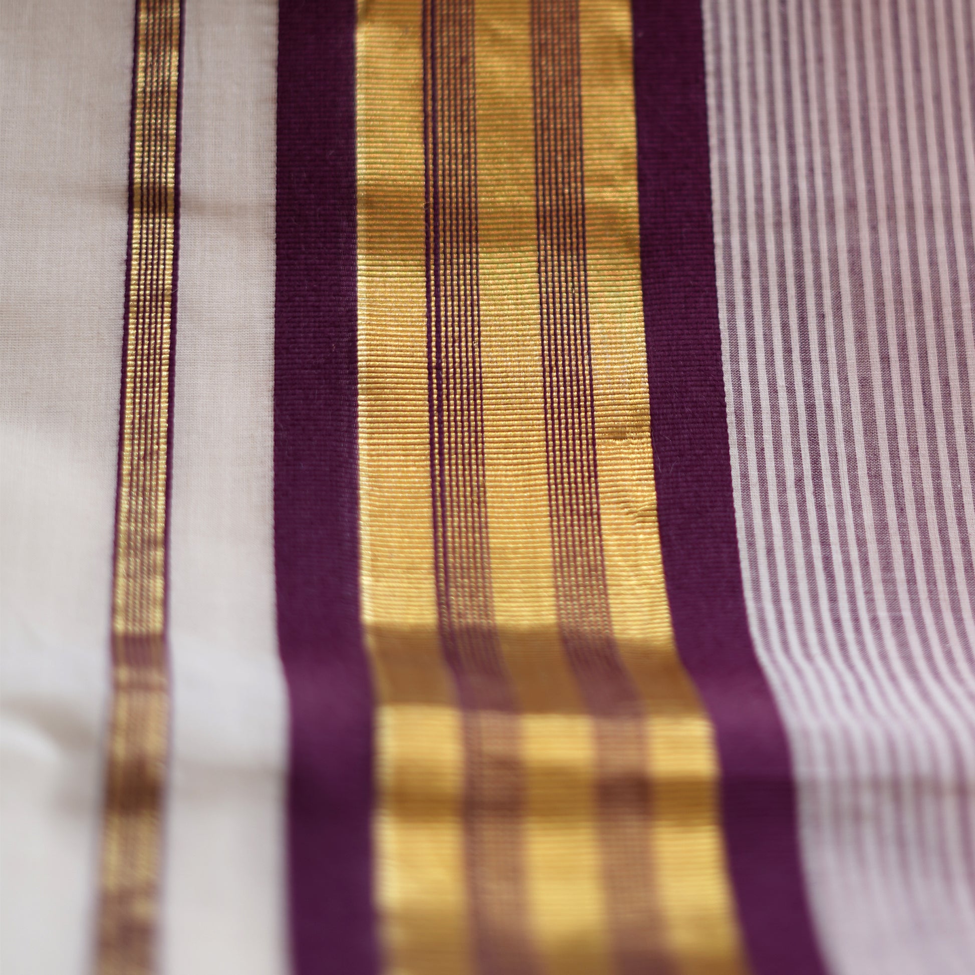 Shop Kerala Kasavu White Saree with Gold & Purple Border detailing Online