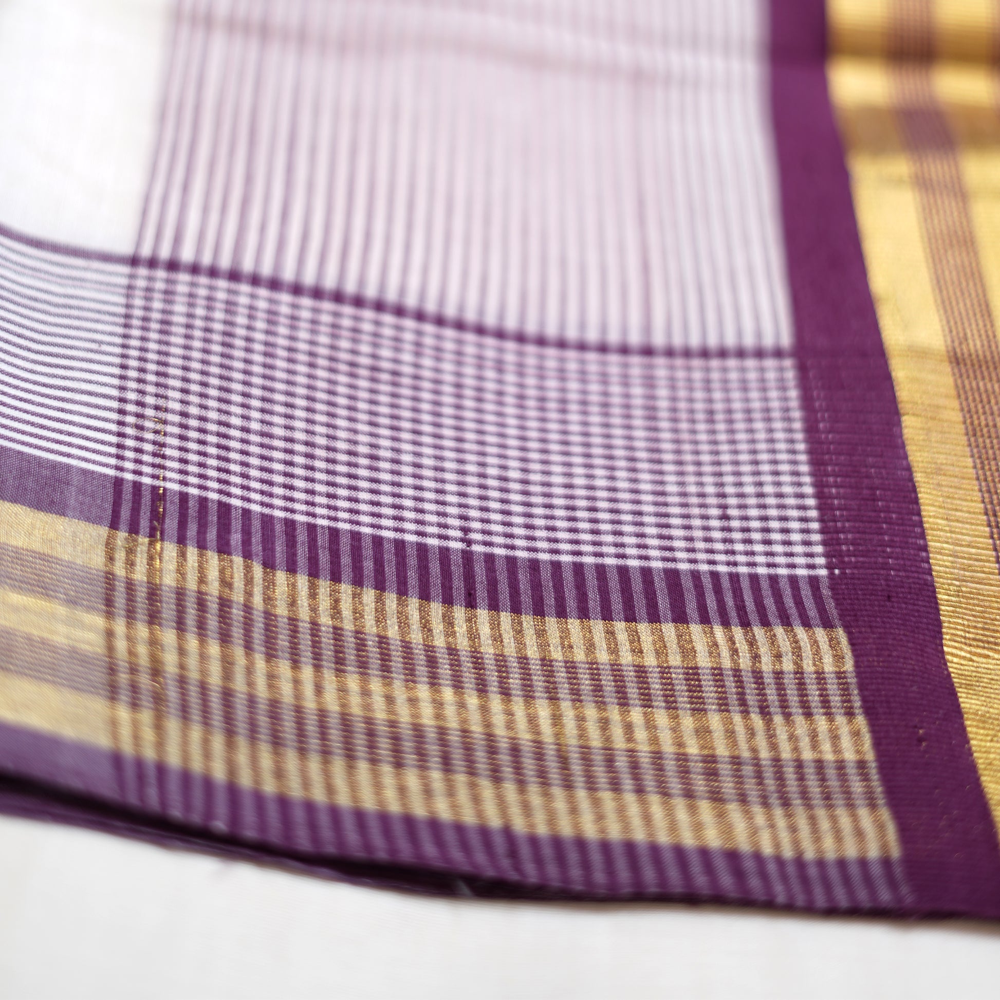 Shop Kerala Kasavu White Saree with Gold & Purple Border detailing Online