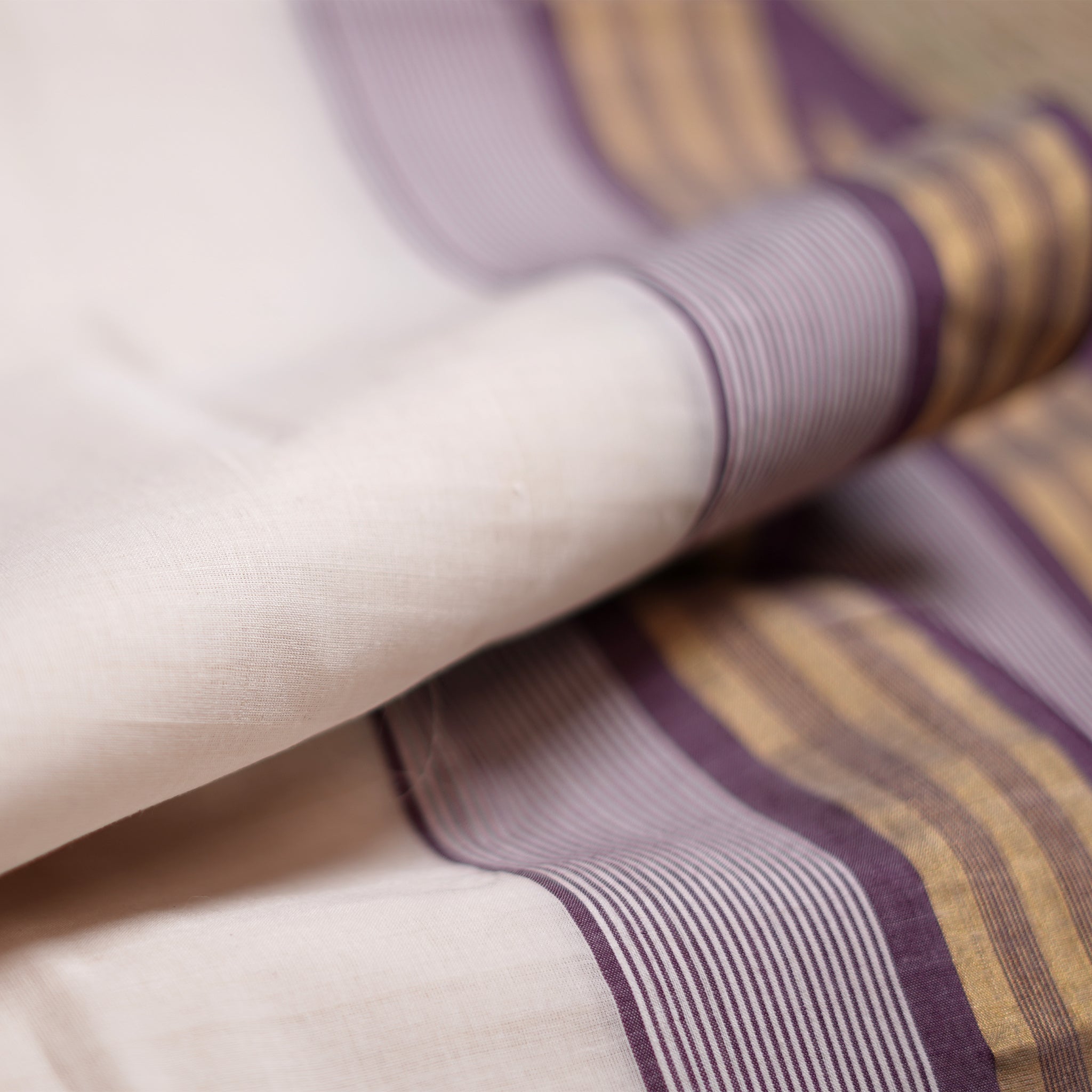 Shop Kerala Kasavu White Saree with Gold & Purple Border detailing Online