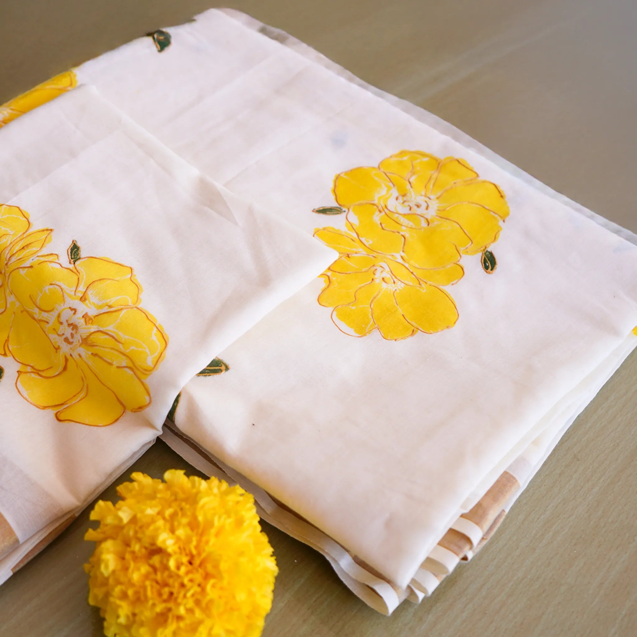 Elegant Kerala Kasavu Saree with Hand-Painted Yellow Floral Motifs