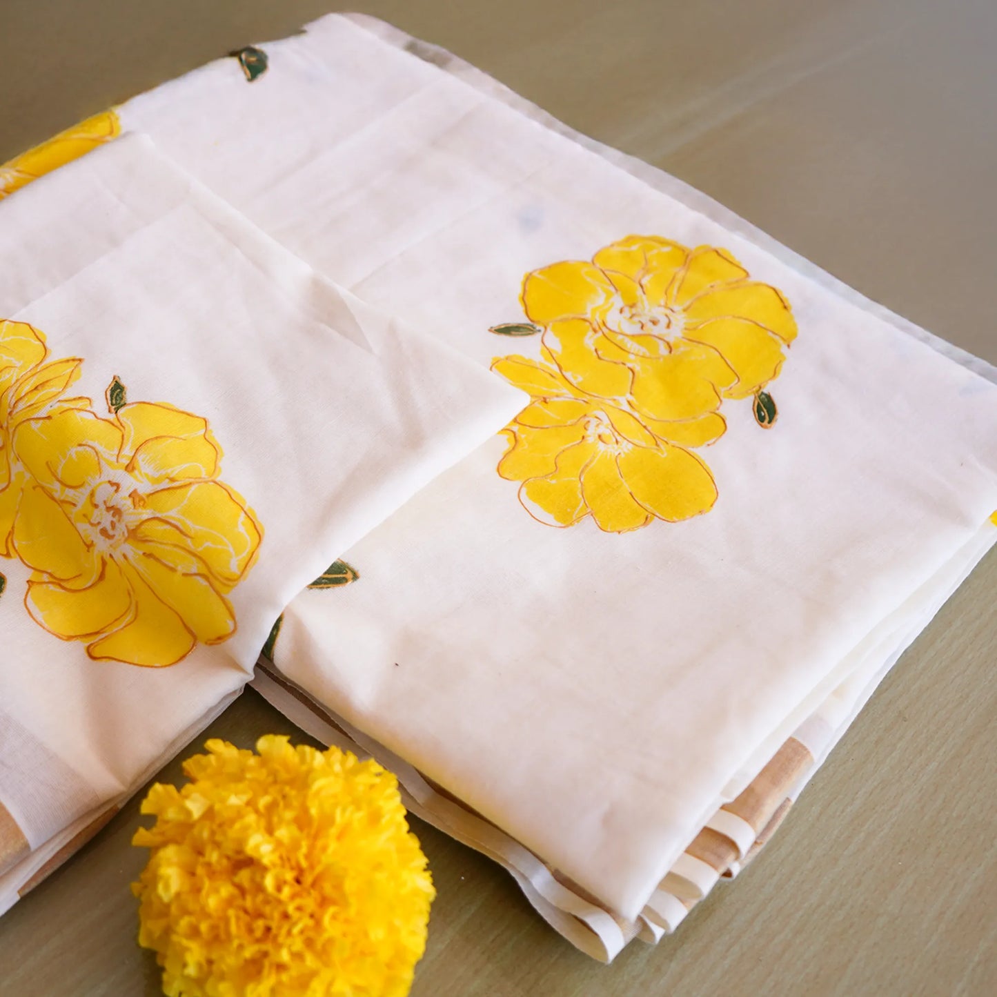 Elegant Kerala Kadavu Saree with Hand-Painted Yellow Floral Motifs