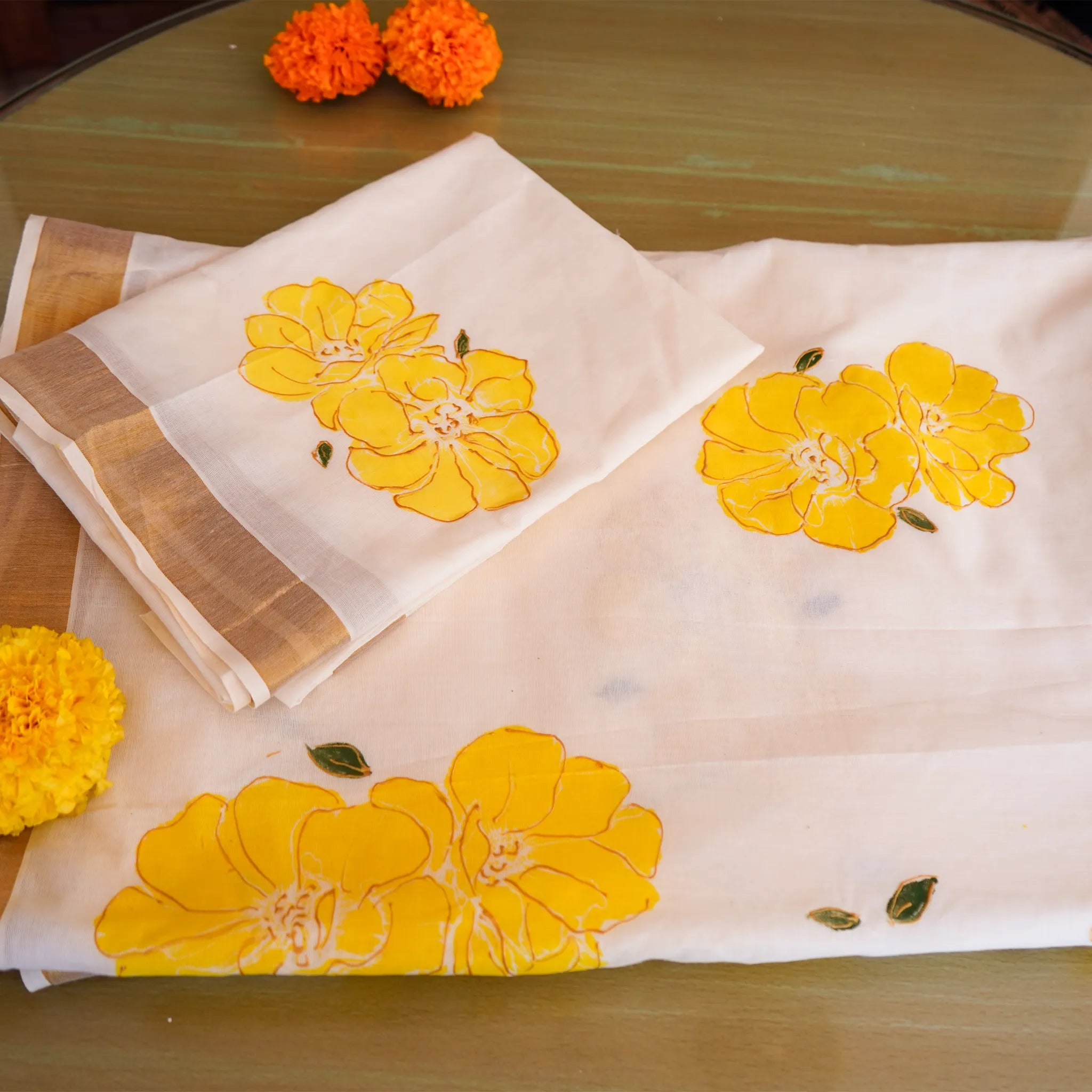 Elegant Kerala Kasavu Saree with Hand-Painted Yellow Floral Motifs