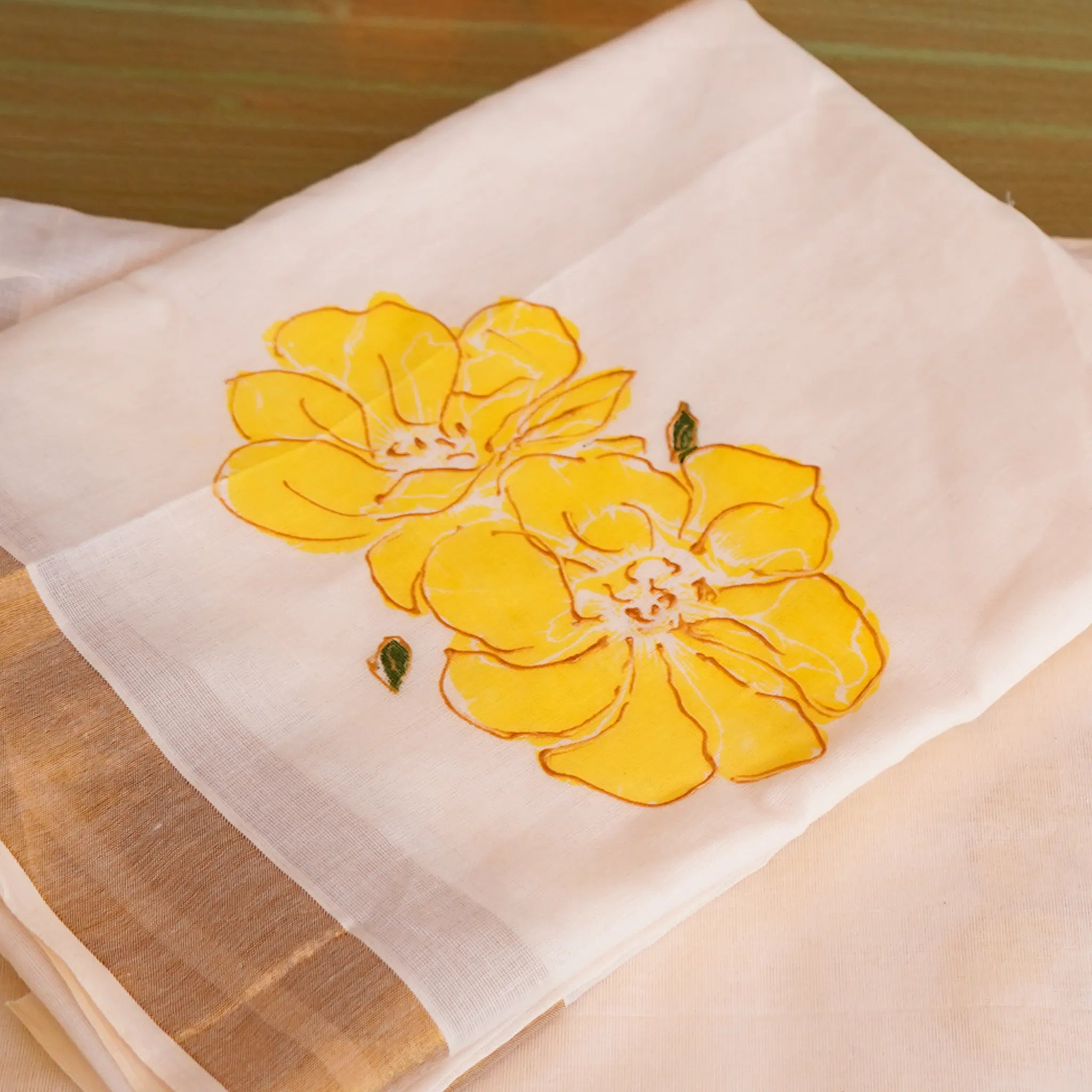 Elegant Kerala Kasavu Saree with Hand-Painted Yellow Floral Motifs