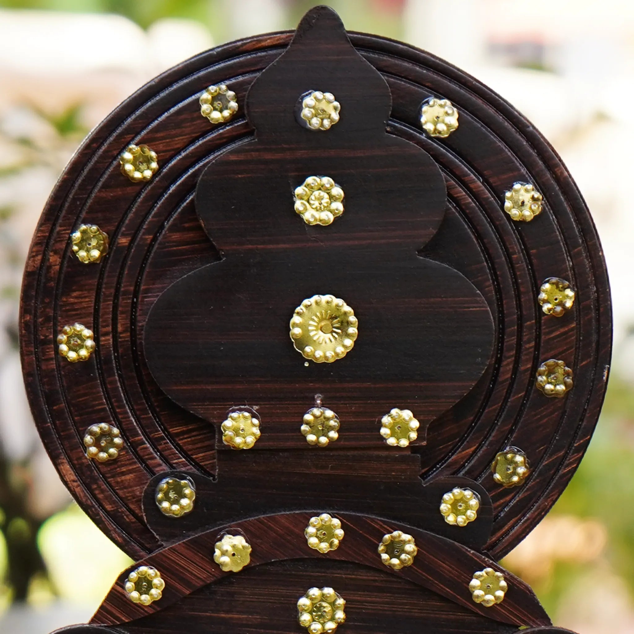 wooden boat with a Kathakali head Crown