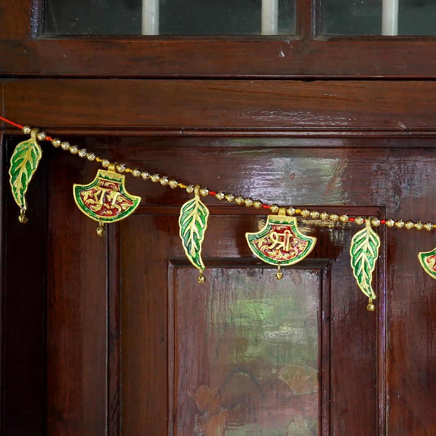 Hand Fan shaped Toran with Ganesh and Leaf