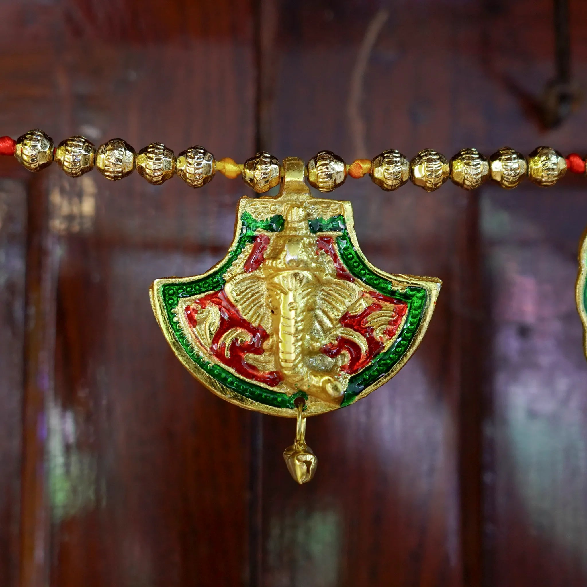 Hand Fan shaped Toran with Ganesh and Leaf