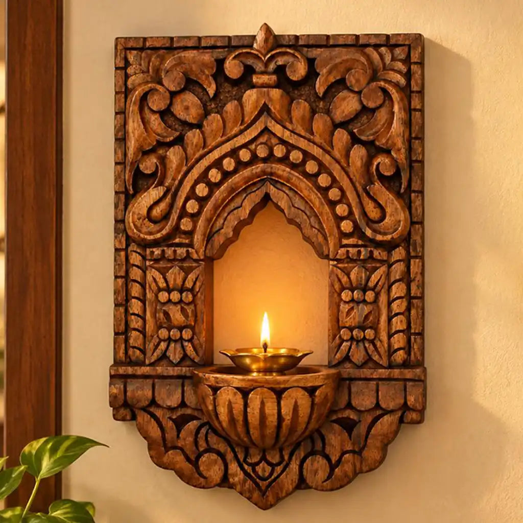 Traditional wooden vilakku maadam displayed on a heritage-inspired interior wall