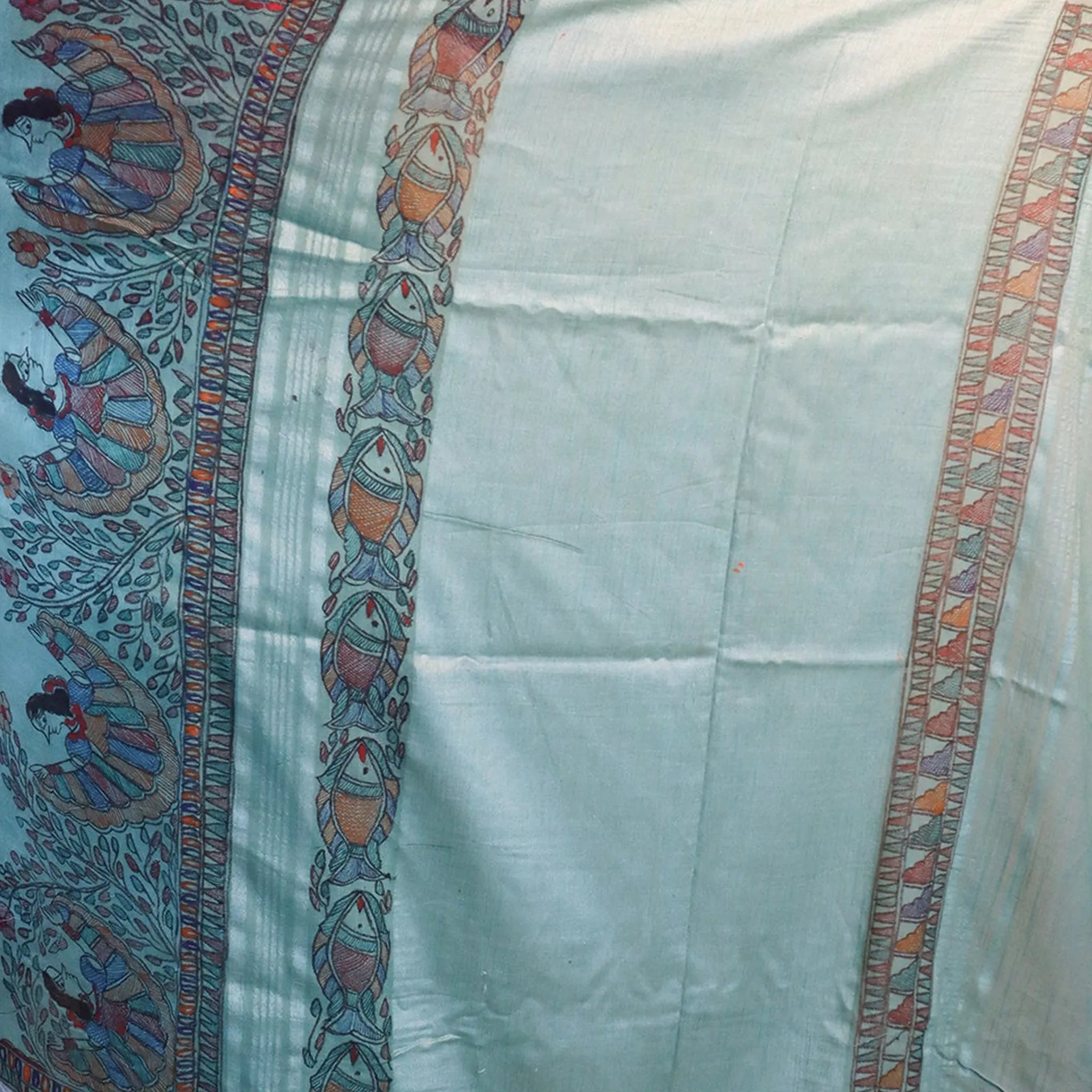 Light Blue Cotton Linen Saree With A Black Bordered Madhubani Drawings